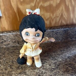 Vintage bowling girl and Cream ceramic doll with Pigtails